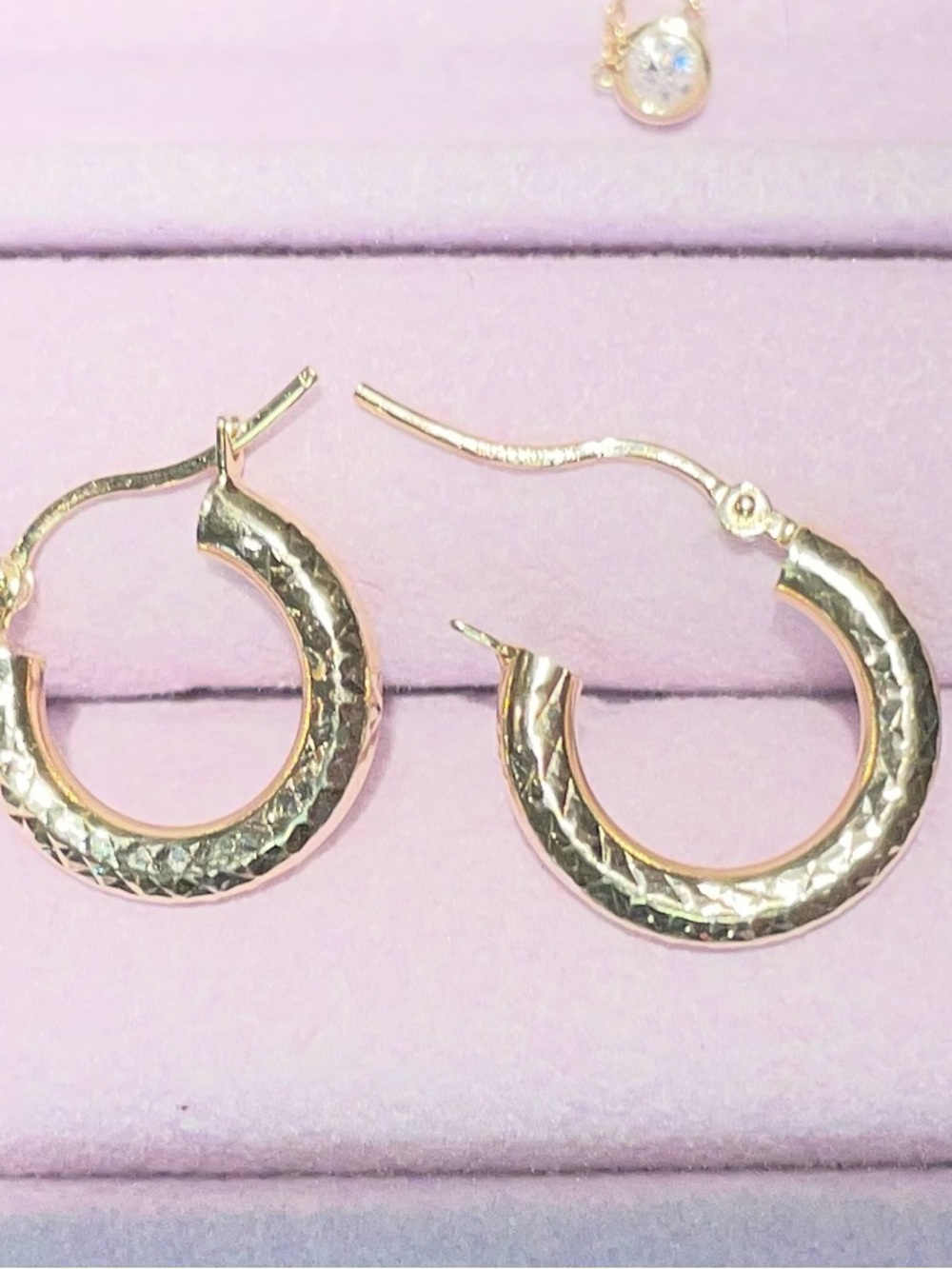 14k Solid Yellow Gold Diamond
Cut Textured Round Hoop Earrings
Marked - Picture 11 of 14